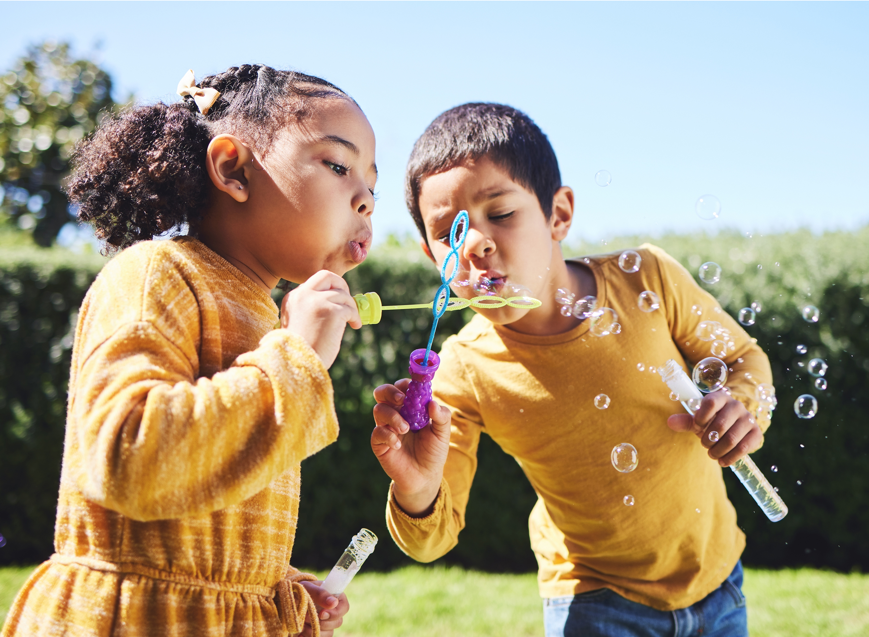 Children playing with bubbles