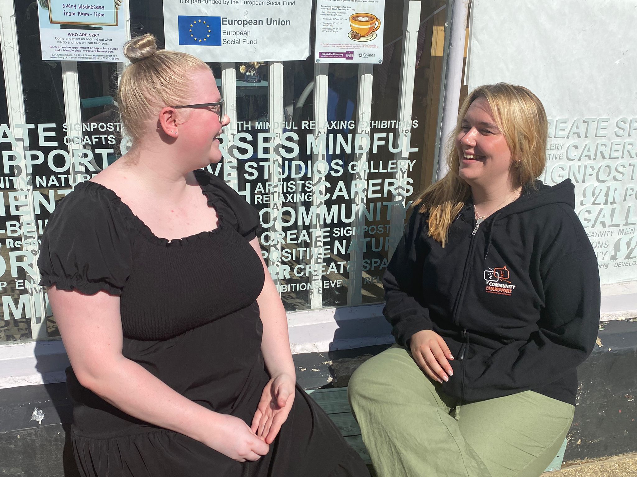 Community champion Jess talking to another person